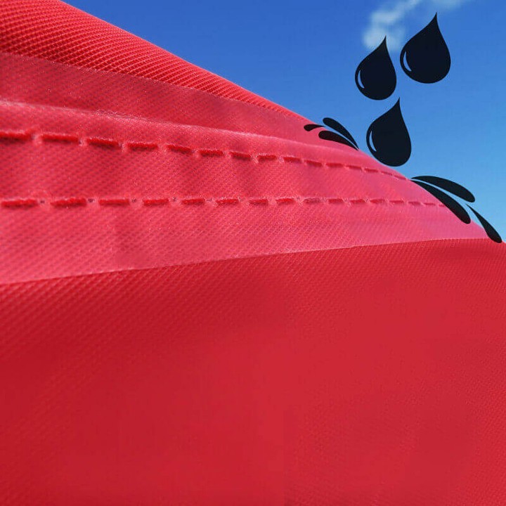 Detail of the red tent roof with wind fastening