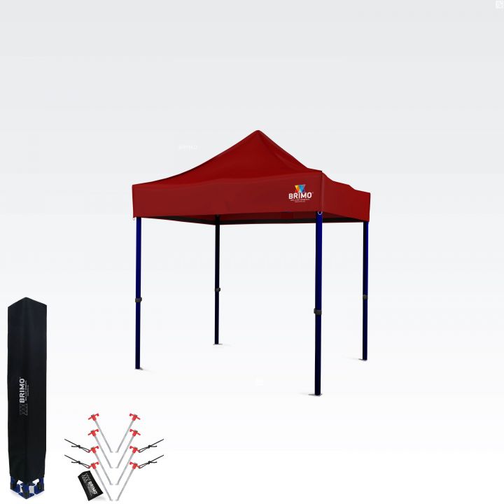 Red scissor tent with a dark blue steel frame, ready for quick setup.